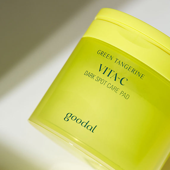 GOODAL Green Tangerine Vita C Dark Spot Care Pad 160ml/70p in a vibrant yellow container for hyperpigmentation care.