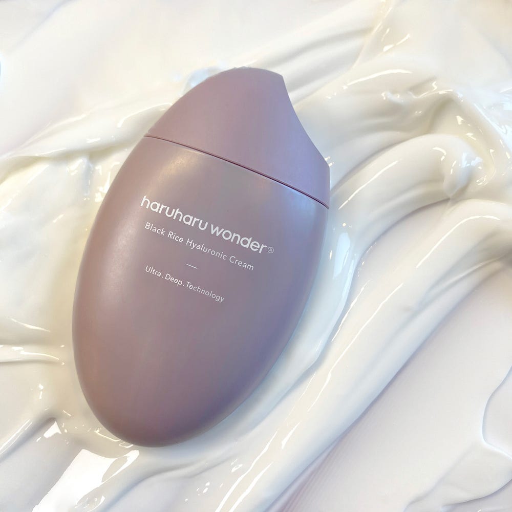 HARUHARU Black Rice 10 Hyaluronic Cream 50ml bottle on smooth cream surface