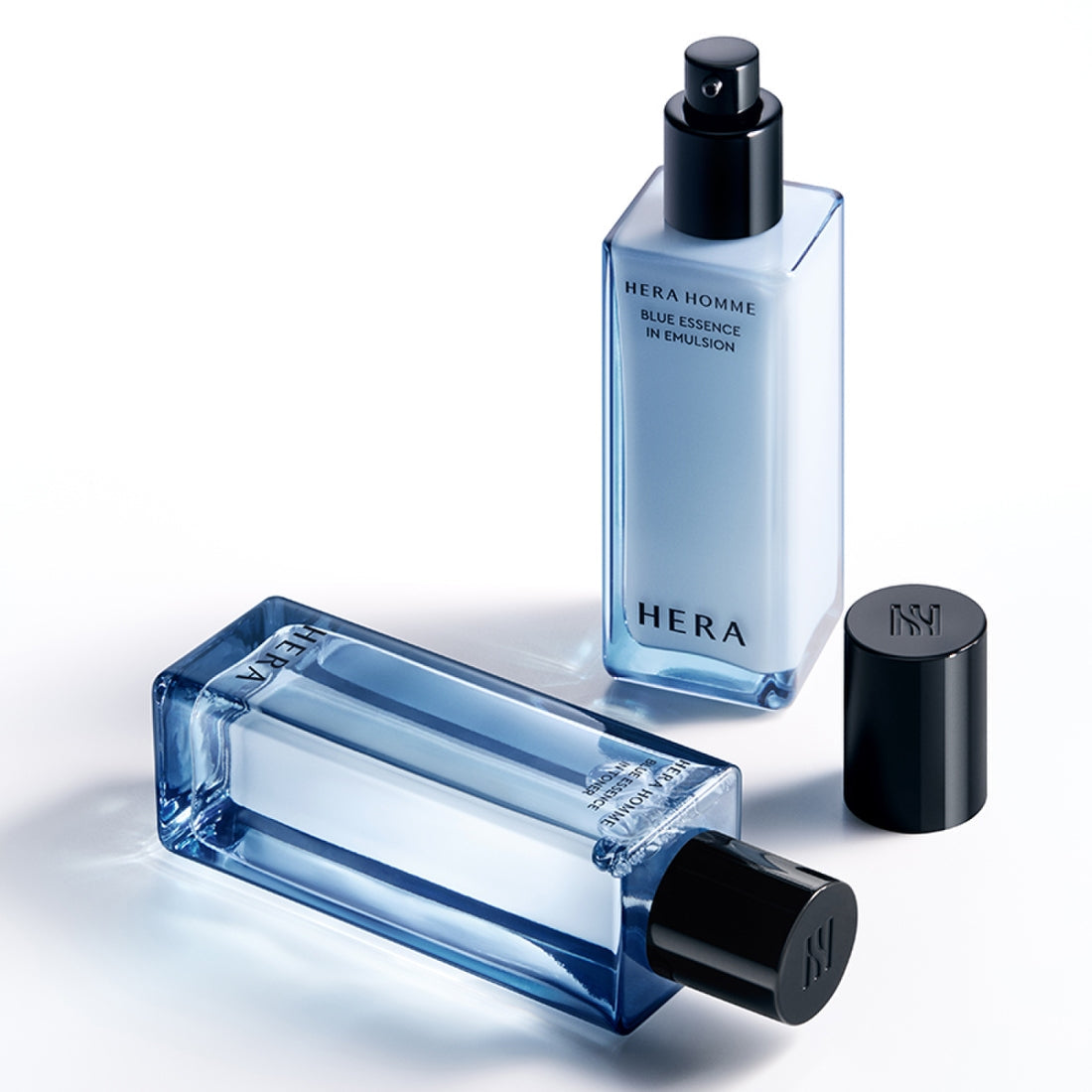 HERA Homme Blue Essence In Toner 125ml - Gentleman Korea product shot of blue glass toner bottle for men's skincare