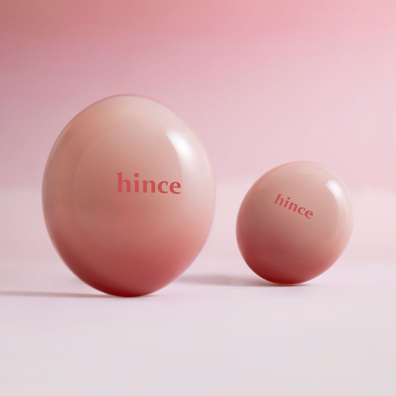 HINCE Low Glow Dewy Ball (Lip&Cheek) in elegant pink packaging, perfect for adding a dewy finish to lips and cheeks.