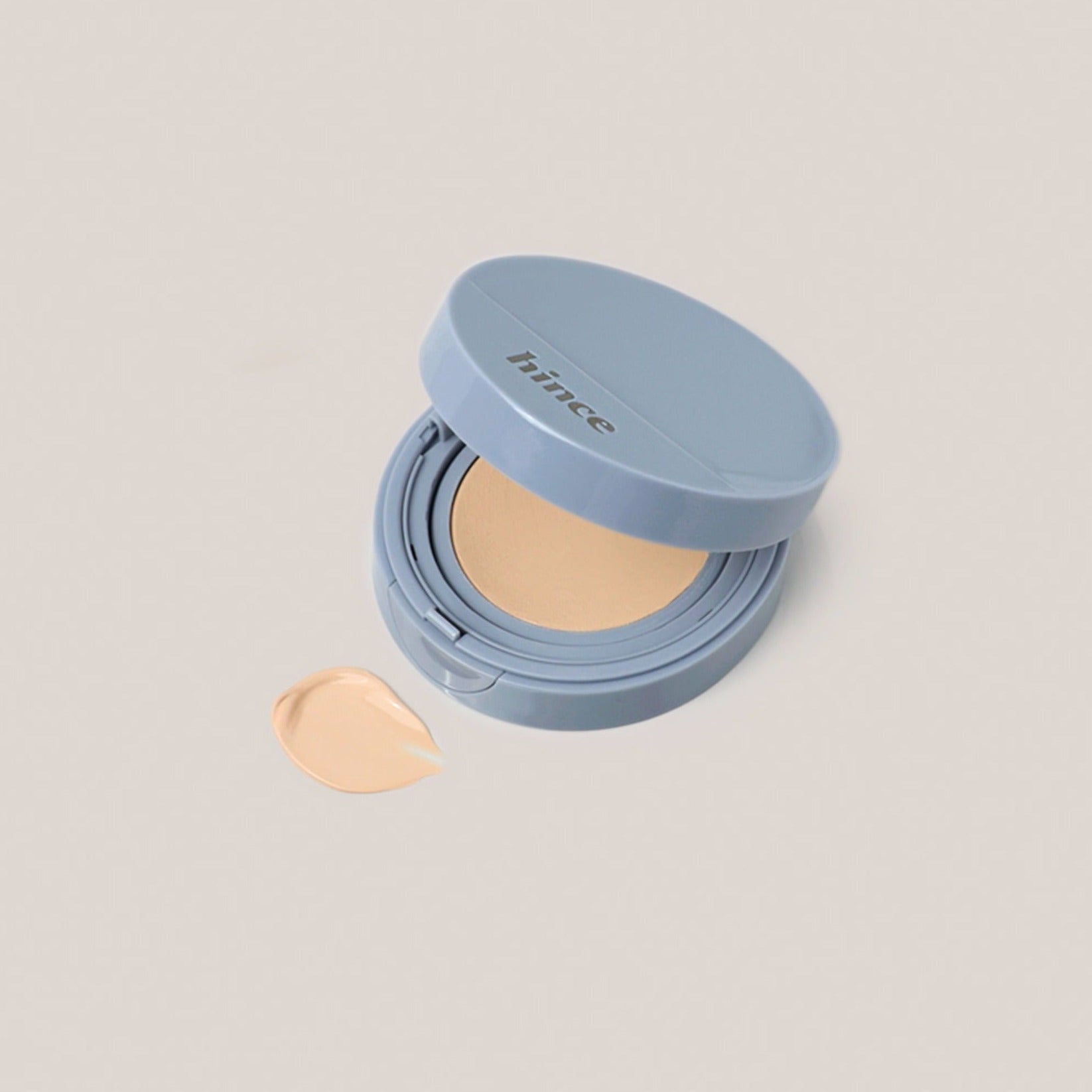 HINCE Second Skin Mesh Matte Cushion in sleek compact case with beige foundation swatch, ideal for a flawless matte finish look.
