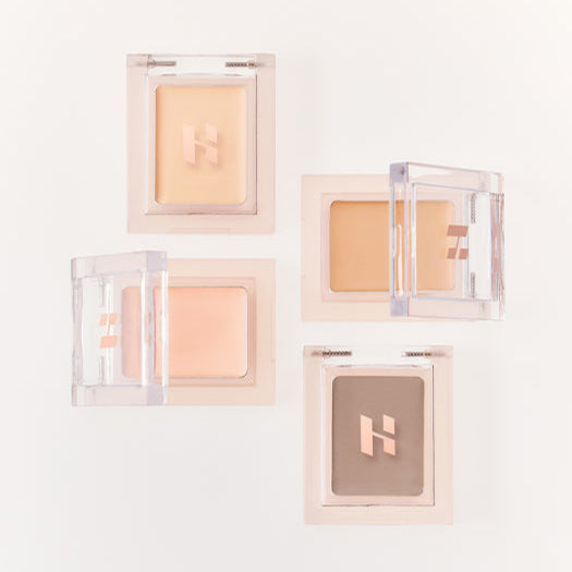 Collection of HOLIKA HOLIKA My Favorite Peace Concealer in various shades, showcasing the product's versatility and range.