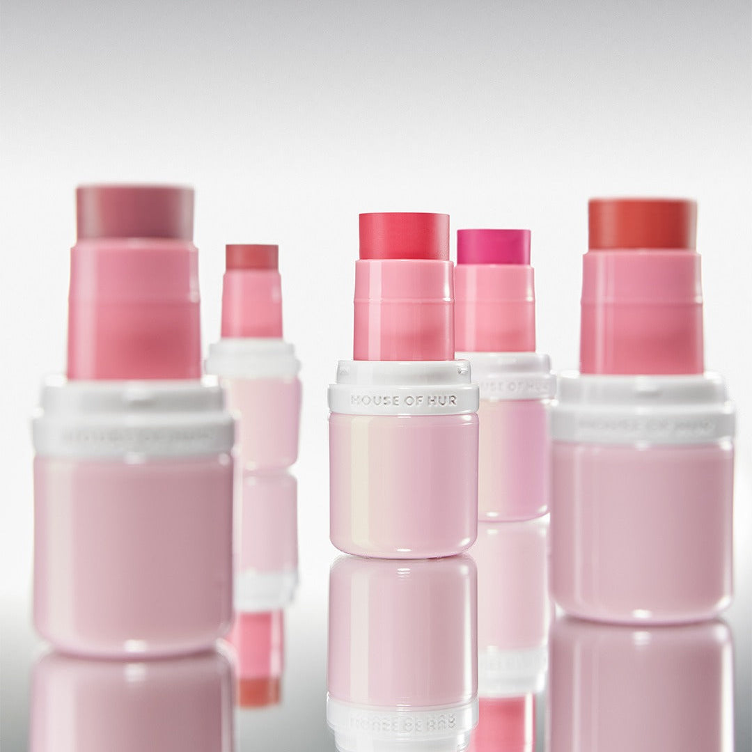 A collection of HOUSE OF HUR Every Cheek Blush products in various shades, showcasing vibrant colors and sleek packaging.