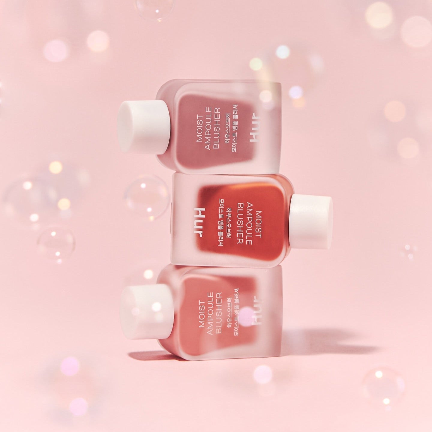HOUSE OF HUR Moist Ampoule Blusher 10ml bottles stacked on pink background