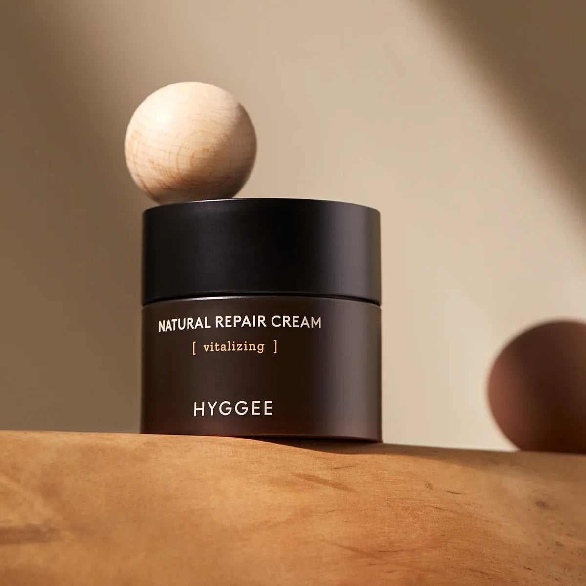 HYGGEE Nature Repair Cream 50ml in elegant packaging on a wooden surface