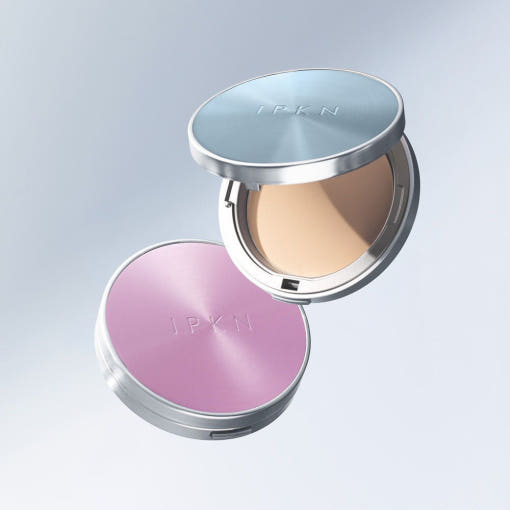 IPKN Perfume Powder 12.5 Pack 15g compact with open and closed cases in silver and pink design on a light background.