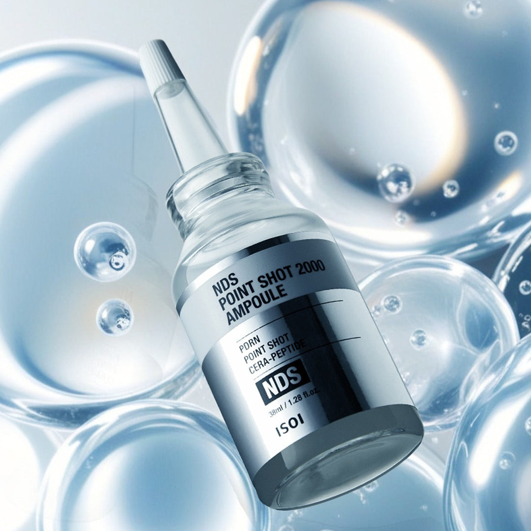 ISOI NDS Point Shot 2000 Ampoule 38ml skincare product bottle with floating bubbles background