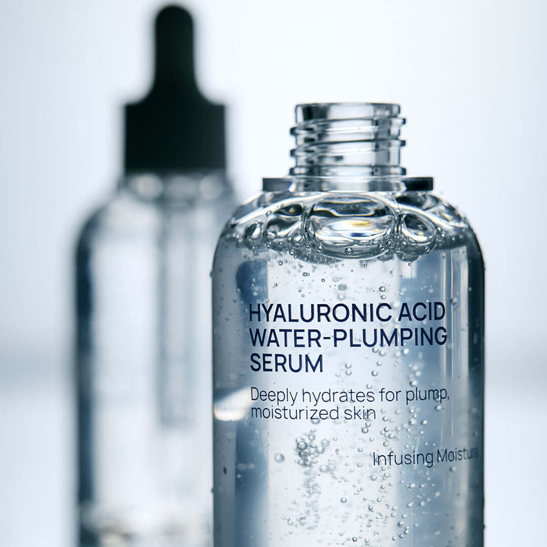Close-up of JUMISO Hyaluronic Acid Water Plumping Moisture Serumm bottle, highlighting hydrating formula for moisturized skin.
