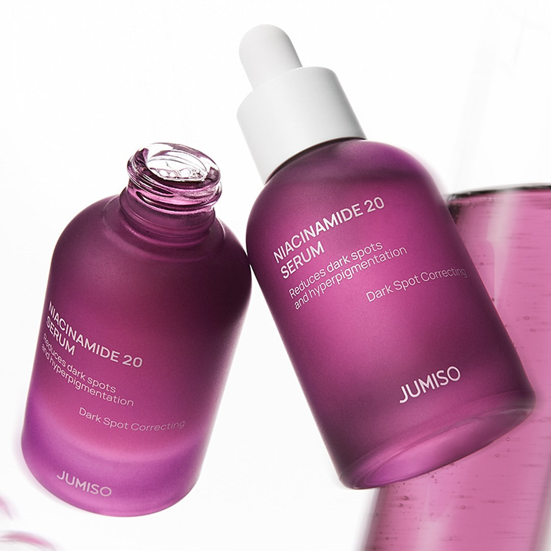 JUMISO Niacinamide 20 Serum 40ml for reducing dark spots and hyperpigmentation in purple glass bottles.