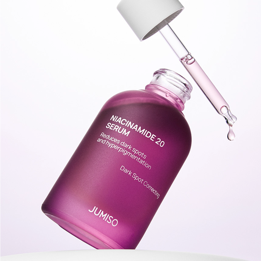 JUMISO Niacinamide 20 Serum 40ml bottle with pipette, dark spot corrector, shown pouring serum.