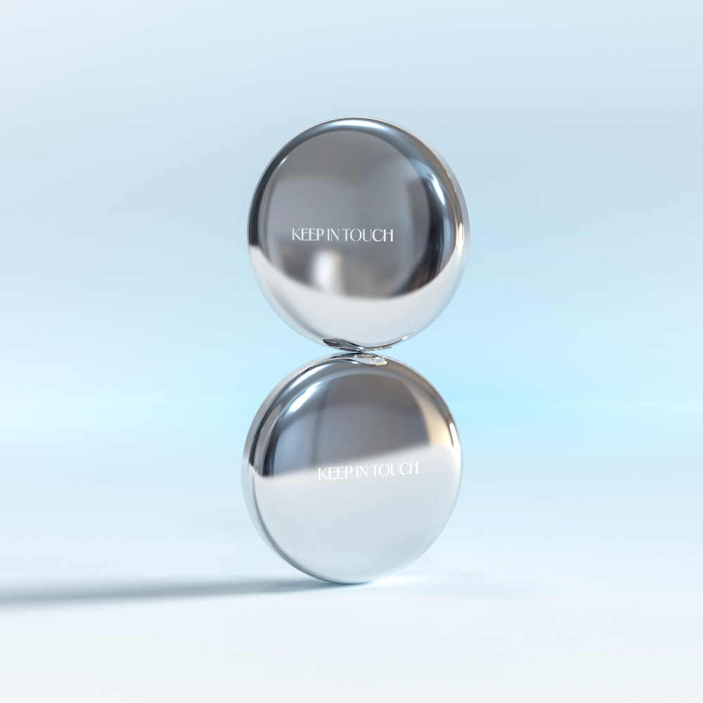 KEEP IN TOUCH Soft Cloud Blur Powder Pact in sleek, reflective packaging against a light background.