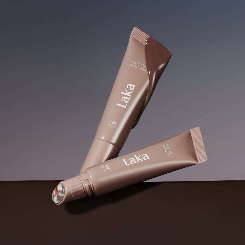 Two tubes of LAKA Fruity Lip Glossionner in elegant packaging.