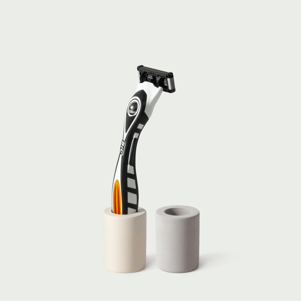 LAZY SOCIETY Diatomaceous Earth Mini Holder with razor placed in cream and gray stone-like holders – Gentleman Korea skincare accessory for men