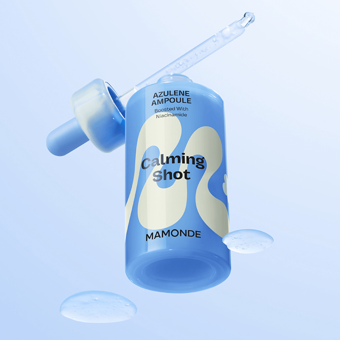 MAMONDE Calming Shot Azulene Trace Moisture Ampoule 50ml with floating droplets on a light blue background.
