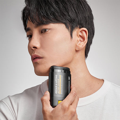 MIP Repair & Lifting Trouble Soothing Aftershave 65g applied by gentleman model, Gentleman Korea men’s skincare product packaging visible