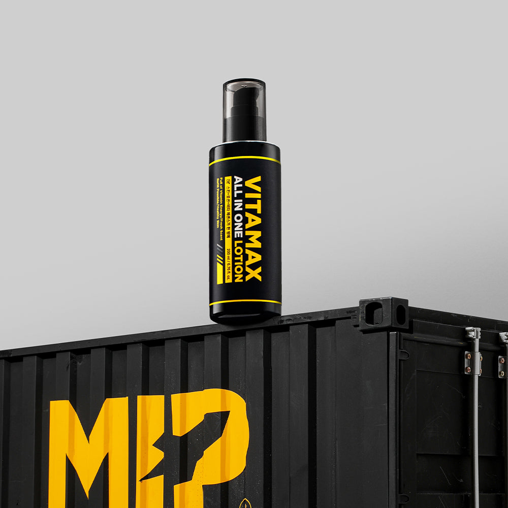 MIP Vitamax Ehitening ALl-in-One Lotion 200ml bottle on black container by Gentleman Korea, Korean skincare for men