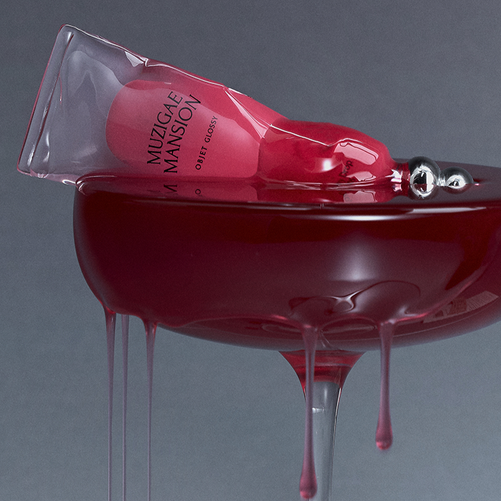 MUZIGAE MANSION Object Glossy product with glossy red liquid drips, luxury and elegance design.