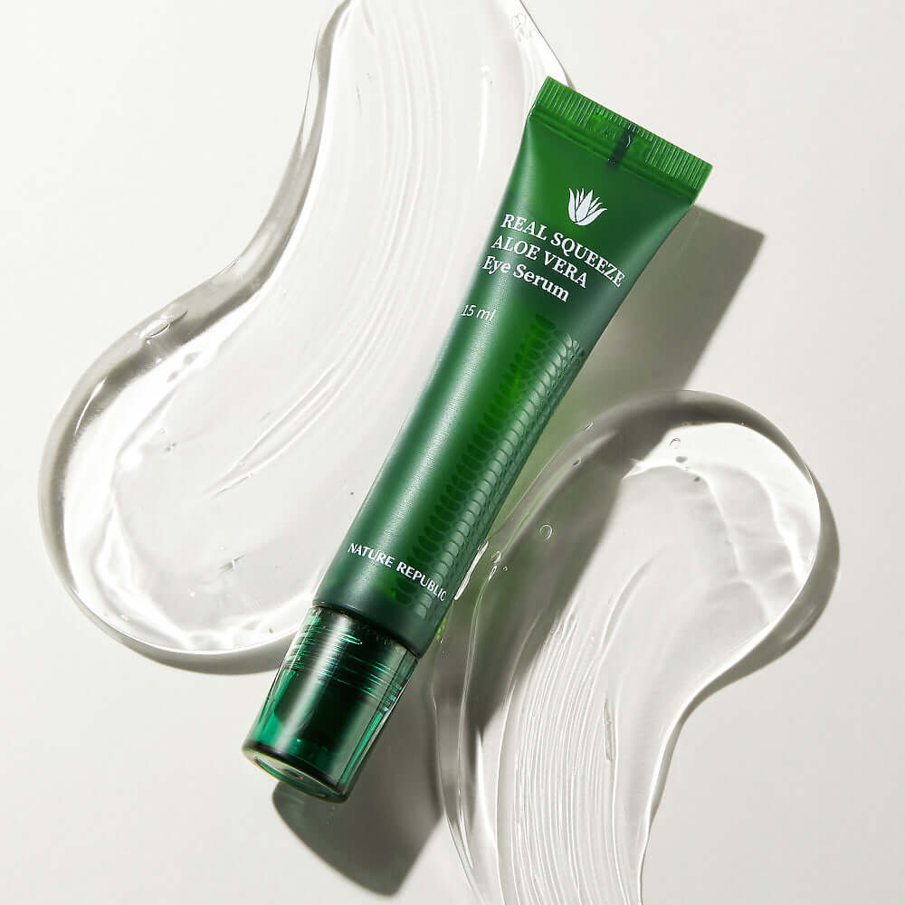 NATURE REPUBLIC Real Squeeze Aloe Vera Eye Serum 15ml tube on a textured background