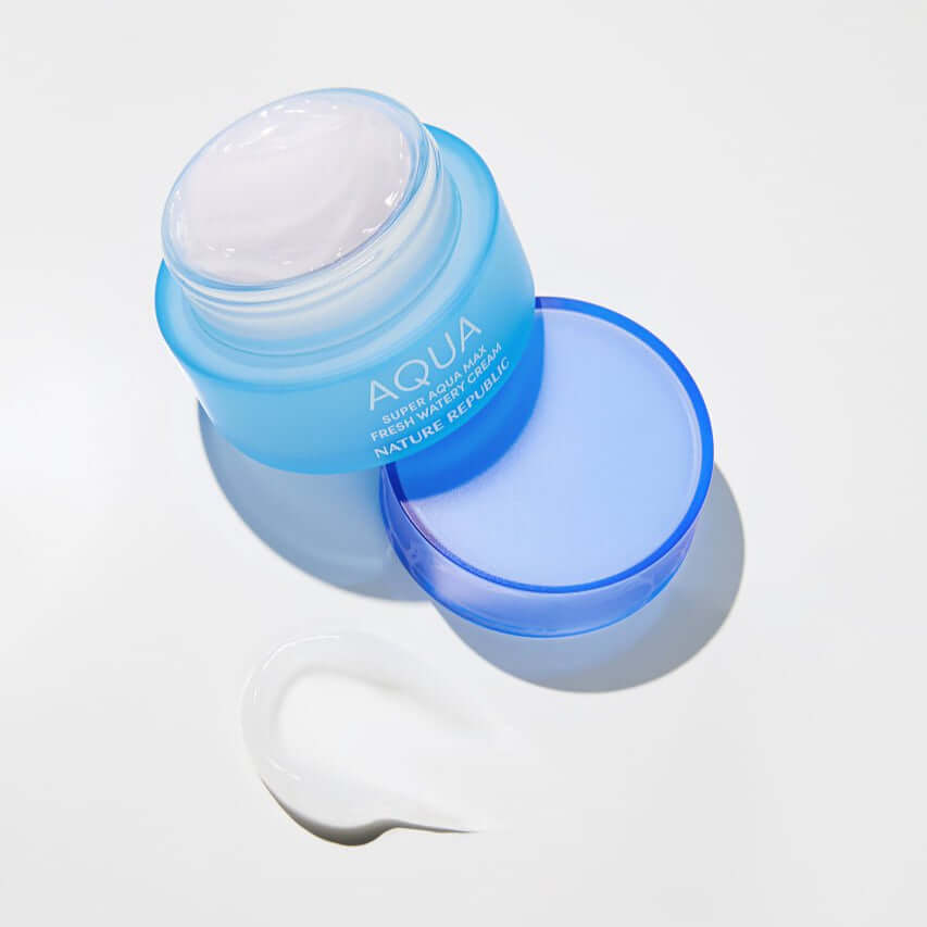 NATURE REPUBLIC Super Aqua Max Fresh Watery Cream 80ml in an open jar, showcasing its creamy texture on a white background.