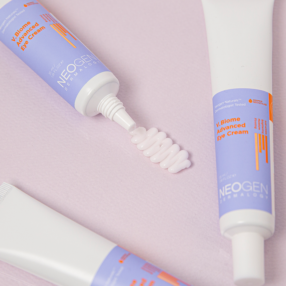 NEOGEN V Biome Advanced Eye Cream 35ml tubes arranged on a pastel background, highlighting skincare texture and packaging details.