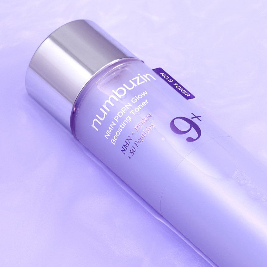 NUMBUZIN No.9 NMN PDRN Glow Boosting Toner 150ml bottle on purple background.