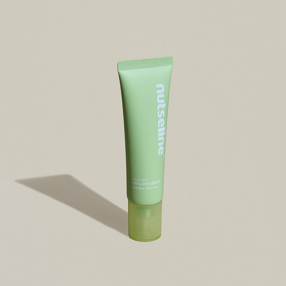 NUTSELINE Cica Nut Hyal Sun Serum 50ml skincare product tube on a neutral background