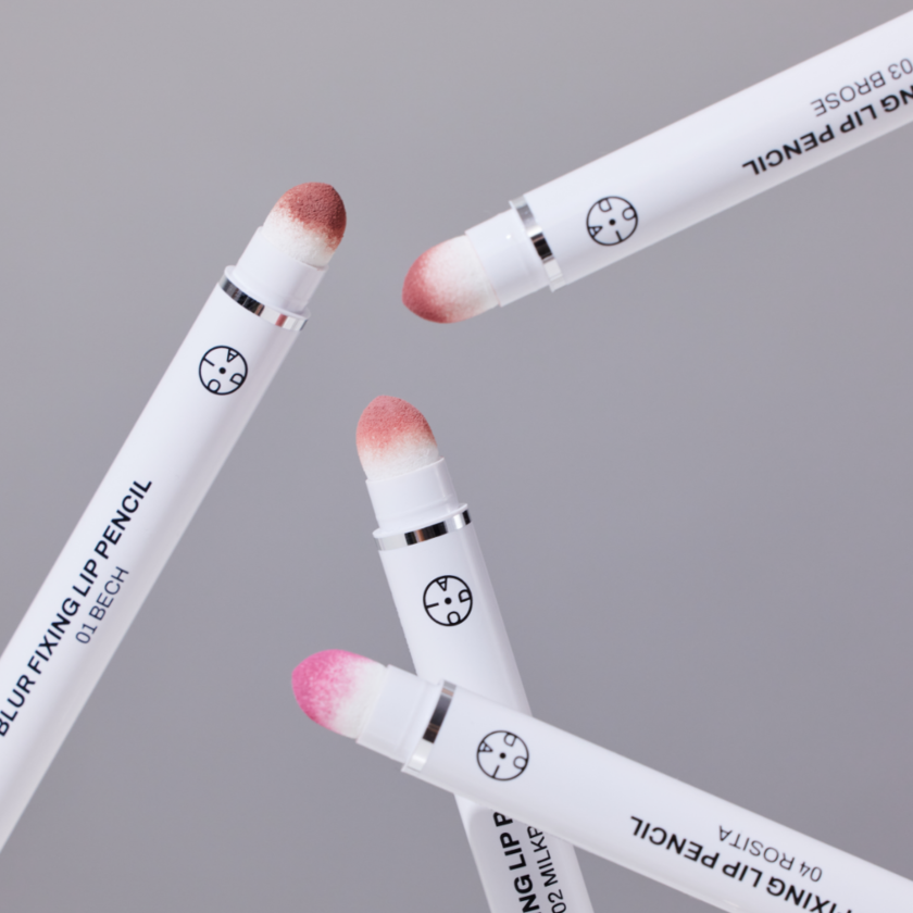 OIAD Blur Fixing Lip Pencil with soft applicators in a dynamic arrangement