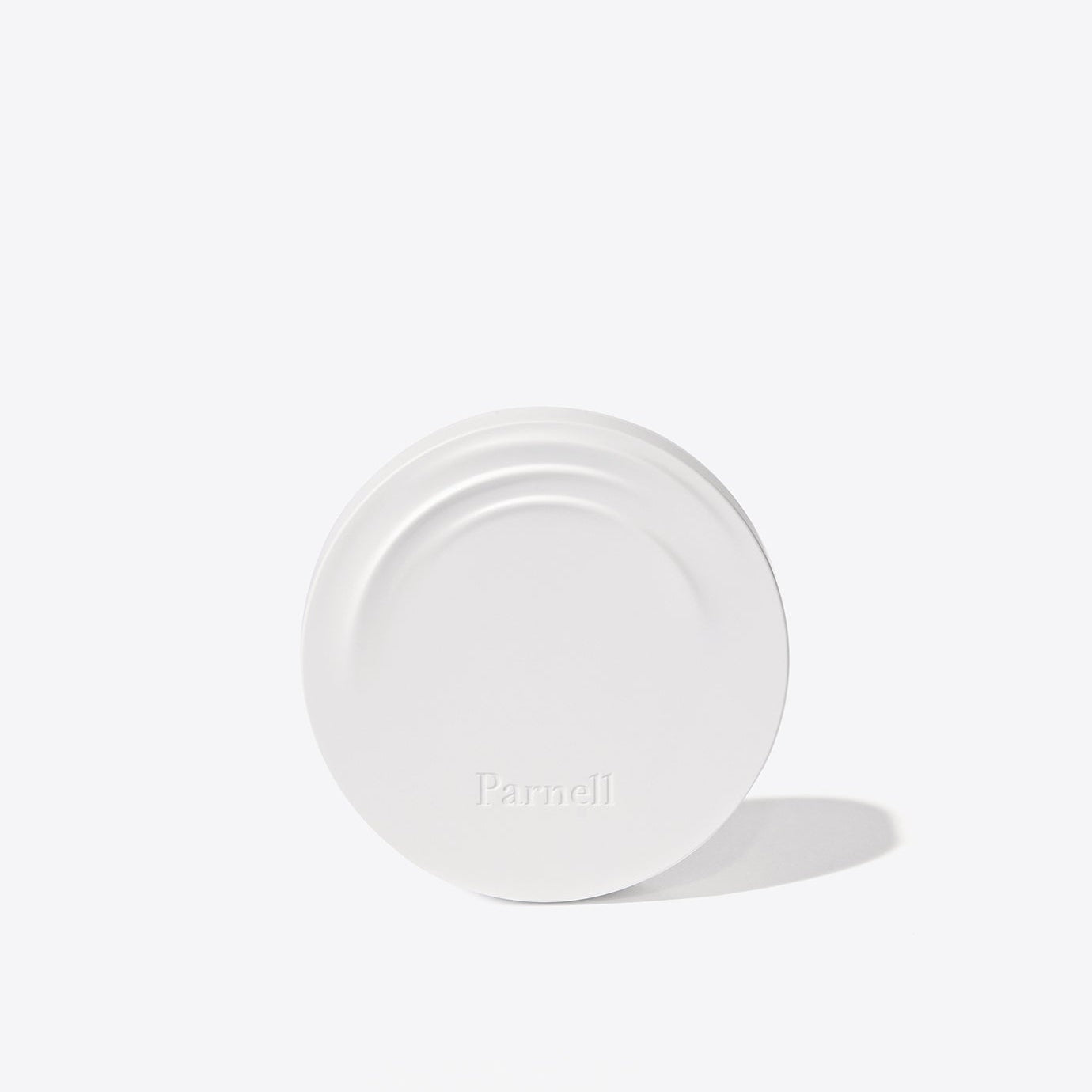 PARNELL Cicamanu Serum Cushion 15g in elegant minimalist round white packaging.