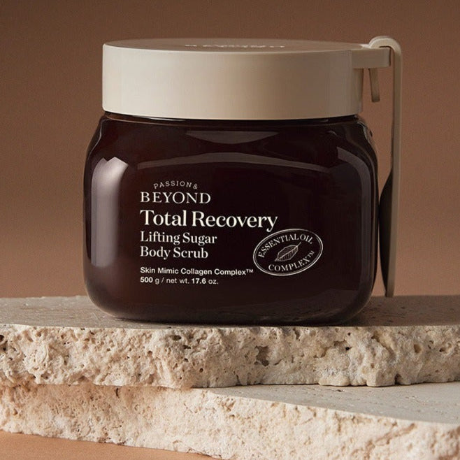 PASSION&BEYOND Total Recovery Lifting Body Scrub 500g on stone surface