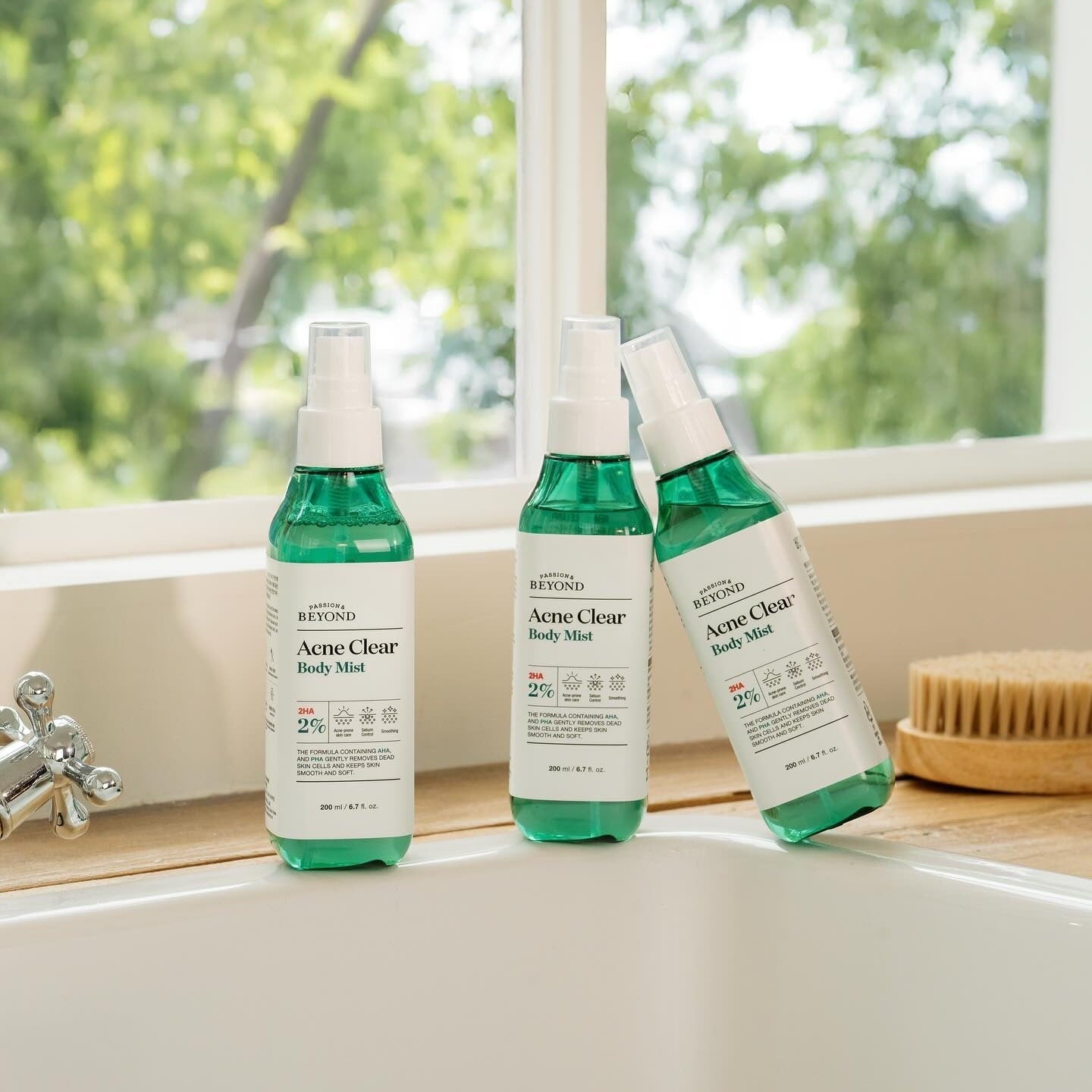 PASSON&BEYOND Acne Clear Body Mist 200ml bottles displayed on a windowsill for acne care