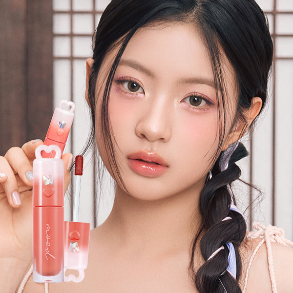 PERIPERA Ink Mood Glowy Tint Princess Hours Collection showcased with model wearing peach lipstick.