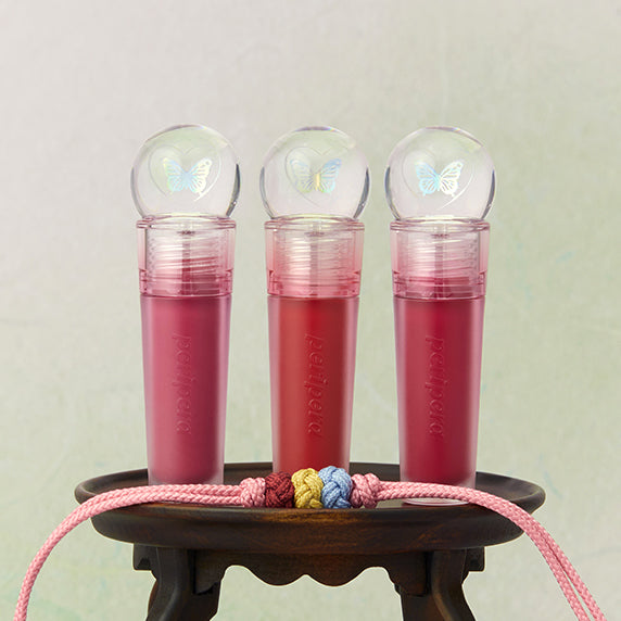 PERIPERA Ink The Jellable Tint bottles displayed with decorative elements.