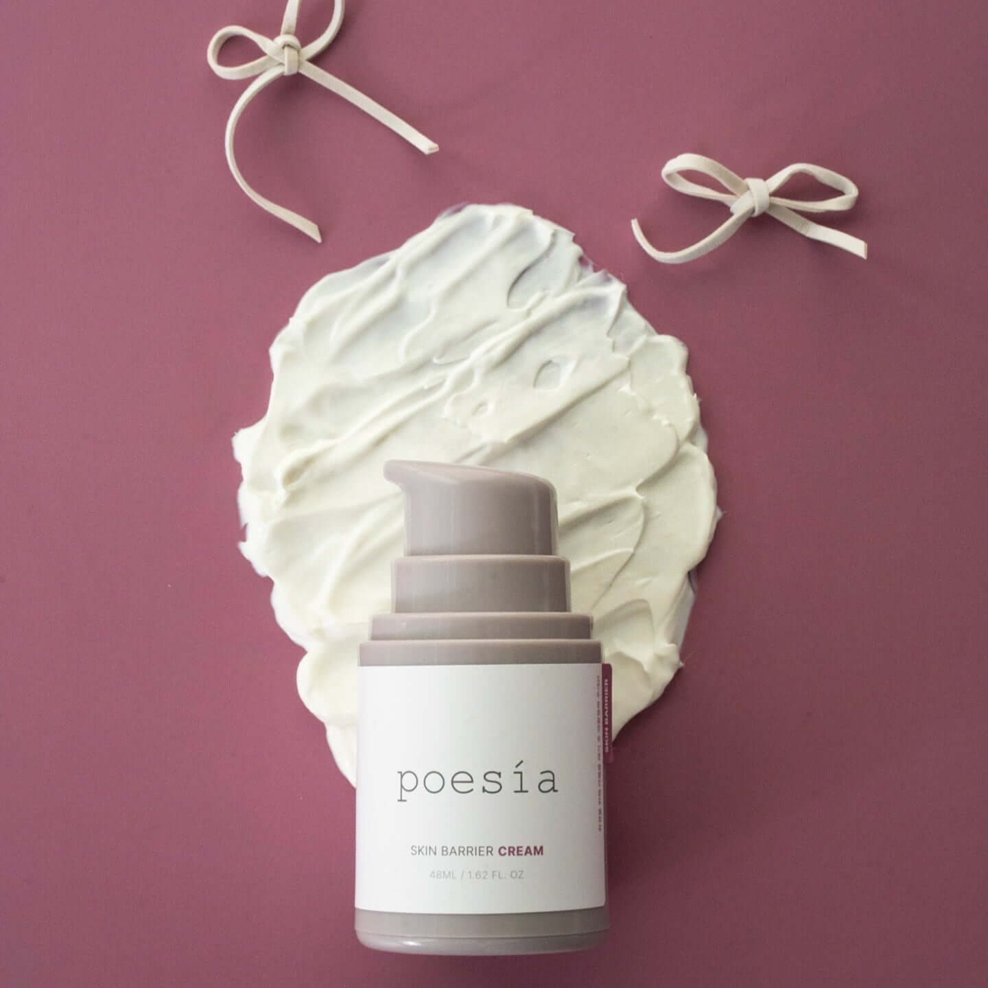 POESÃA Ceramide 3 Liposome Intensive Skin Barrier Cream 48ml on a textured background with decorative bows.