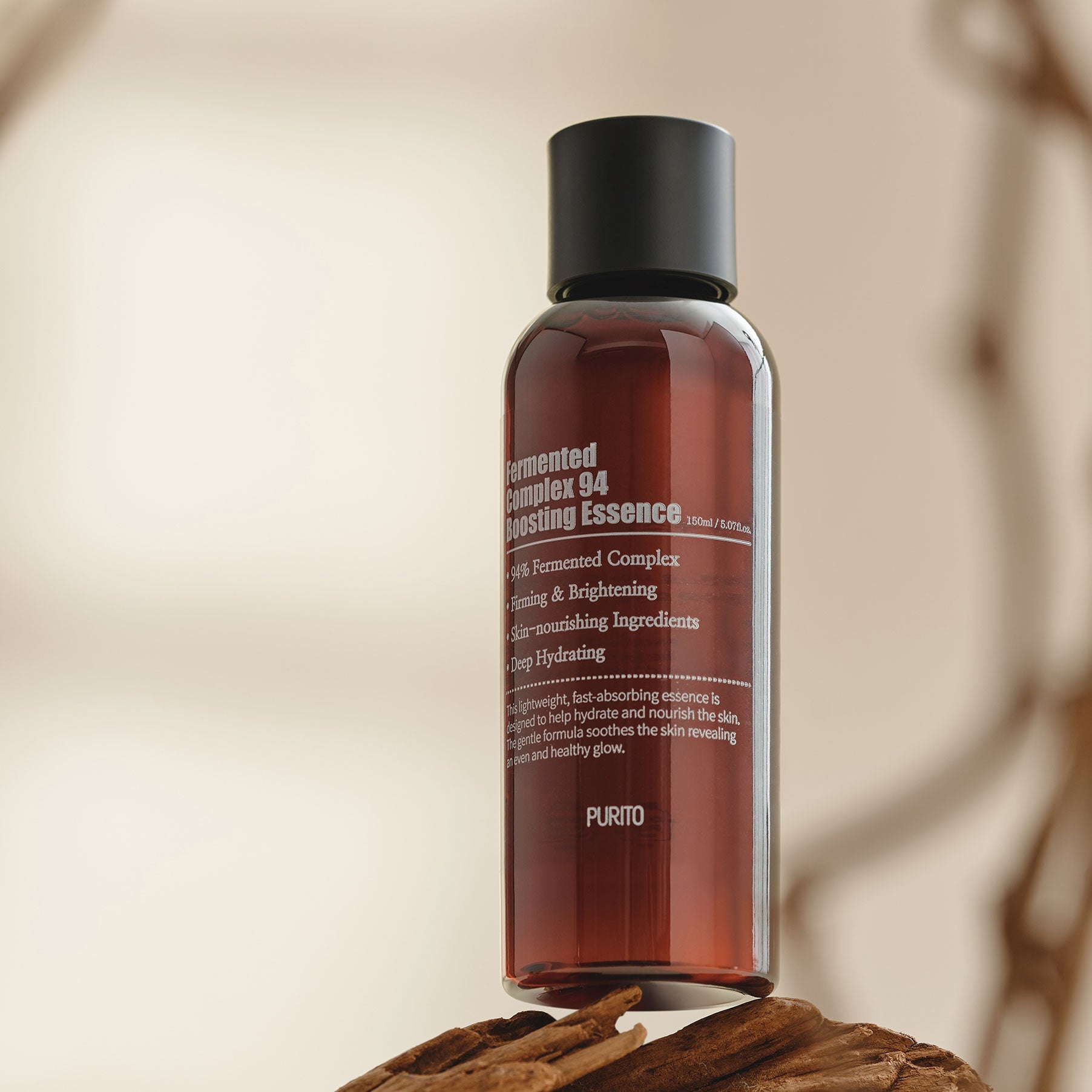 PURITO Fermentedd Complex 94 Boosting Essence 150ml bottle on wooden surface