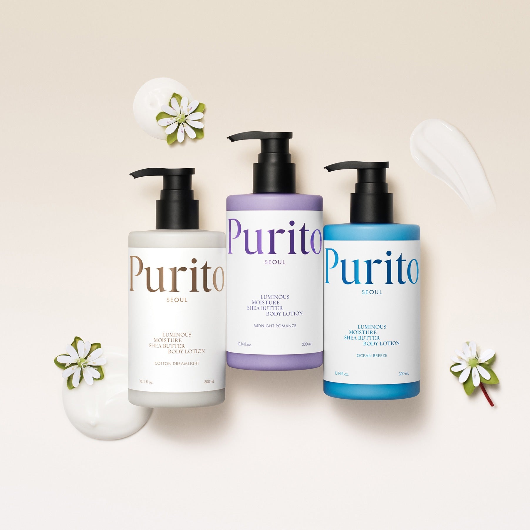 Three bottles of PURITO Luminous Moisture Shea Butter Body Lotion 300ml in assorted colors with lotion textures and flowers.