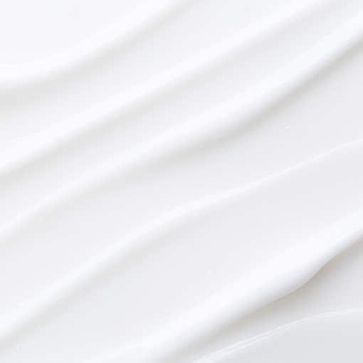 Creamy texture of PYUNKANG YUL Ato Moisturizing Barrier Body Lotion 590ml on surface