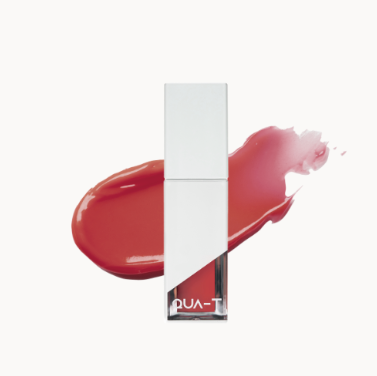 QUA-T The Glass Tattoo Tint in a sleek bottle with vibrant red hue, ideal for striking lip and cheek color applications.