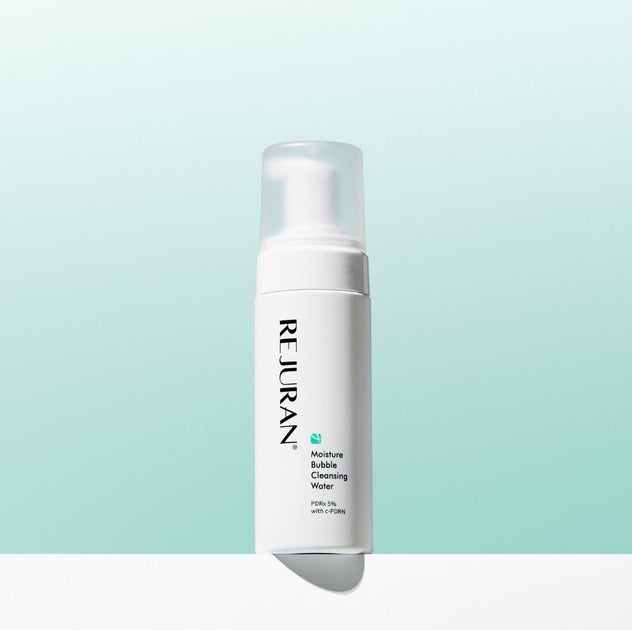 REJURAN Derma Healer Moisture Bubble Cleansing Water 150ml bottle on gradient background