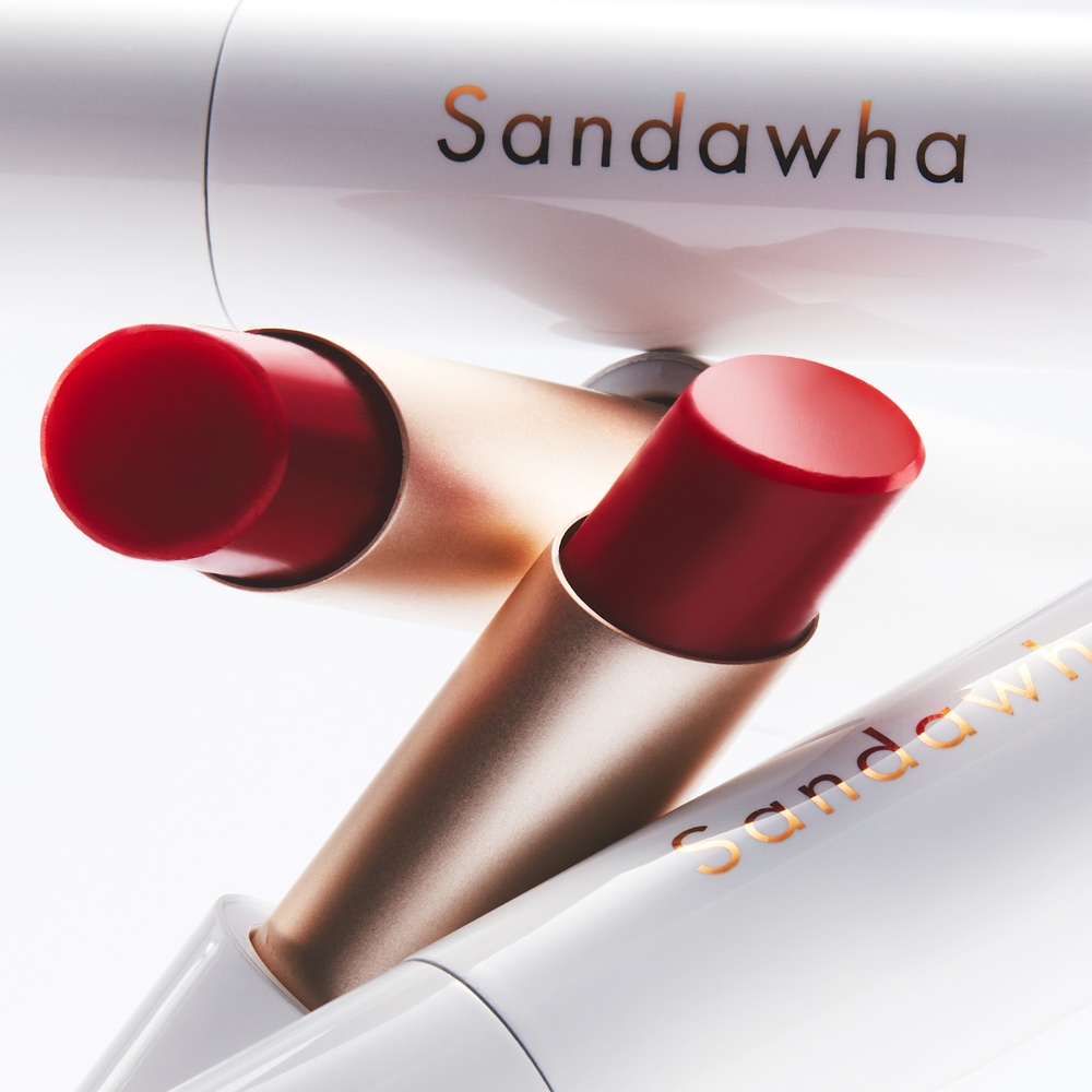 Close-up of SANDAWHA Floral Halo Lip Glow packaging and lipstick shades.