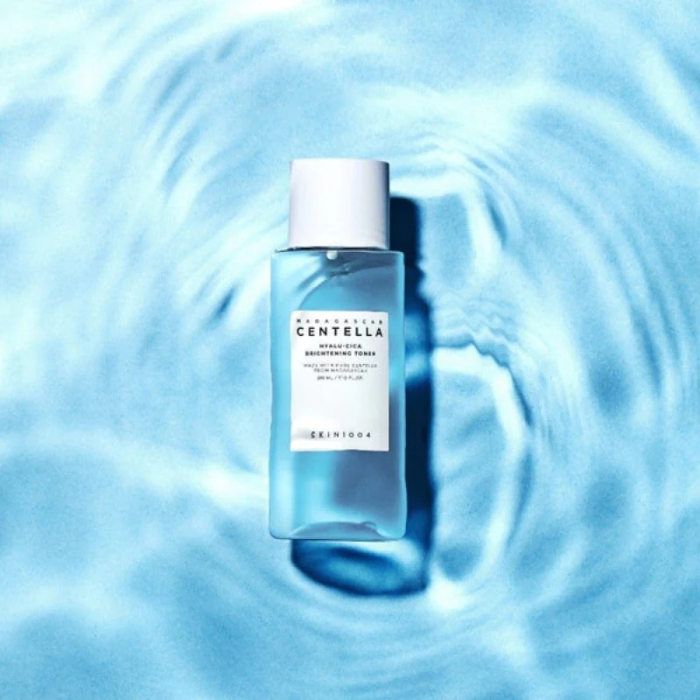 SKIN1004 Madagascar Centella Hyalu-Cica Radiance Toner 210ml bottle on blue water background