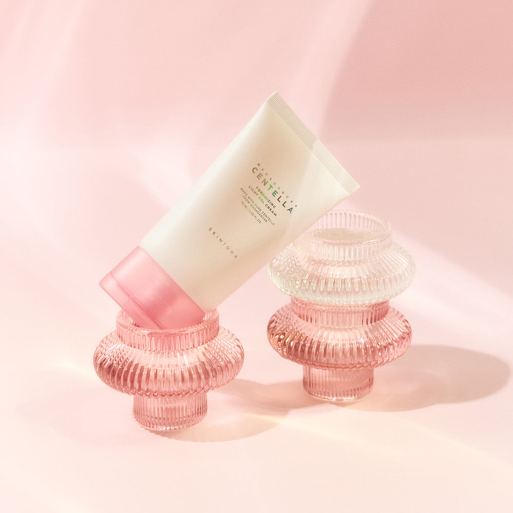 SKIN1004 Madagascar Centella Poremizing Light Gel Cream 75ml showcased on pink glass stands
