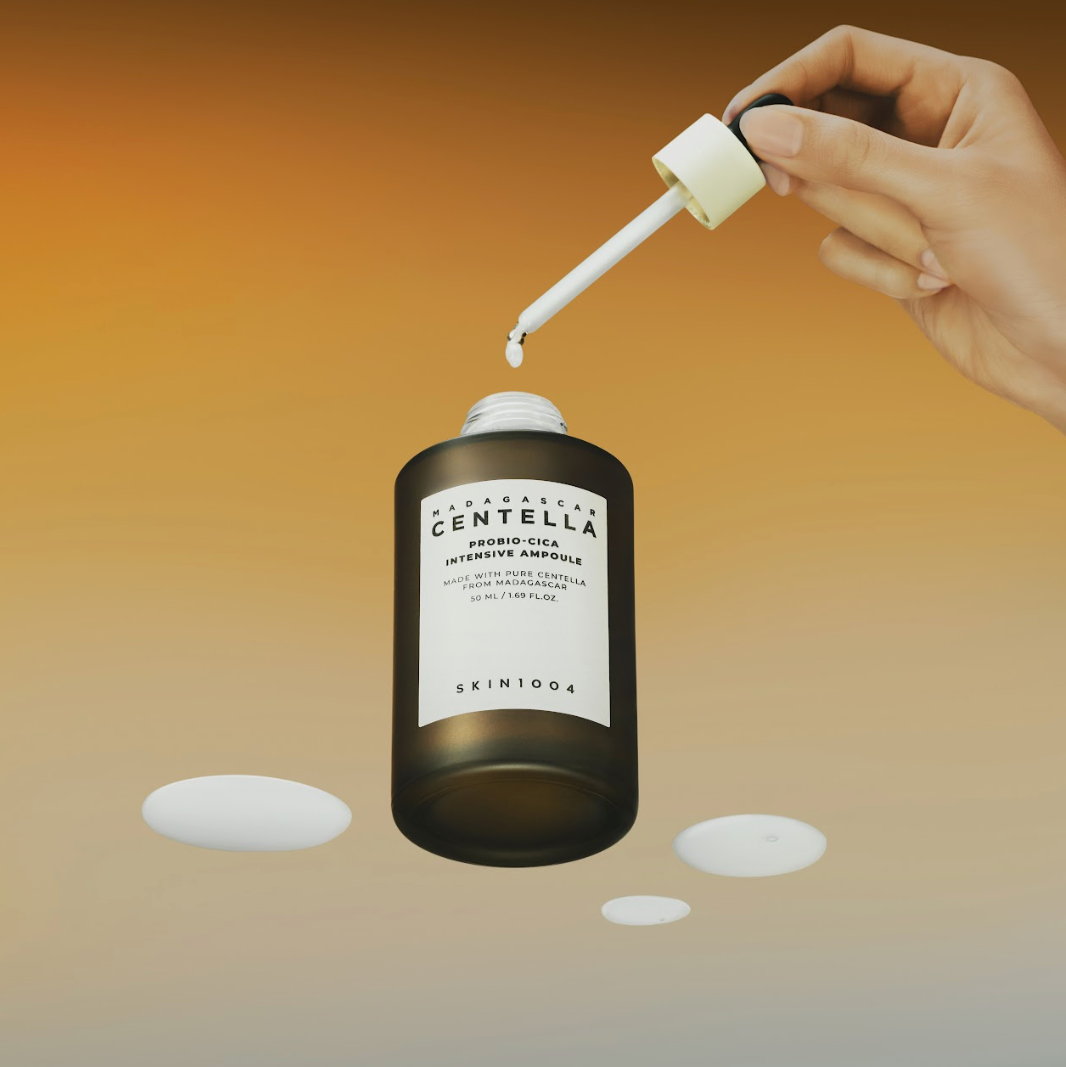 SKIN1004 Madagascar Centella Probio-cica Intensive Ampoule 95ml product being dispensed with a dropper
