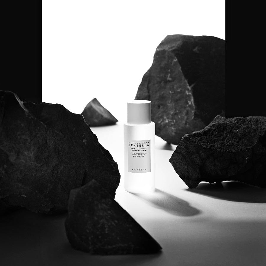 SKIN1004 Madagascar Centella Tone Brightening Boosting Toner 210ml among dark rocks