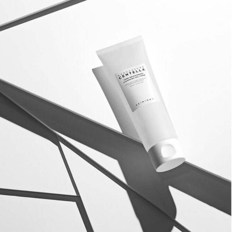 SKIN1004 Madagascar Centella Tone Brightening Cleansing Gel Foam 125ml in minimalistic black and white setting