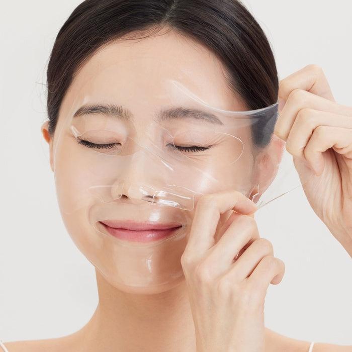 Woman applying SUNGBOON EDITOR Deep Collagen Anti Wrinkle Lifting Mask 37g for skin rejuvenation and wrinkle reduction.