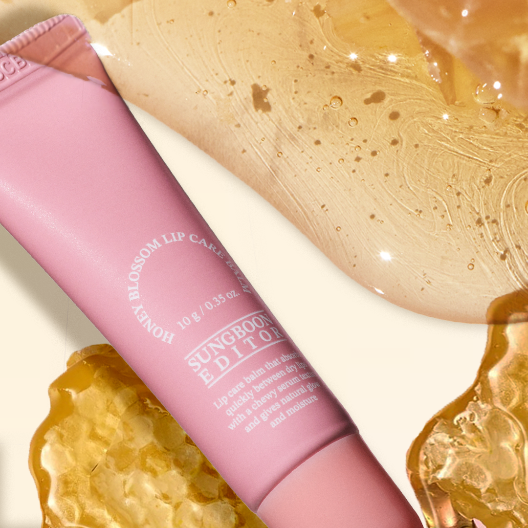 SUNGBOON EDITOR Honey Blossom Lip Care Balm in pink packaging with honey texture background, enhancing lip care and moisture.