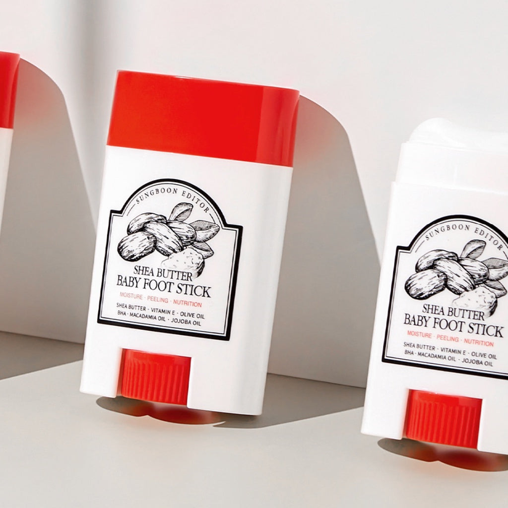 SUNGBOON EDITOR Shea Butter Baby Foot Stick on display, moisturizing and nourishing foot care product with natural oils in red-white container.