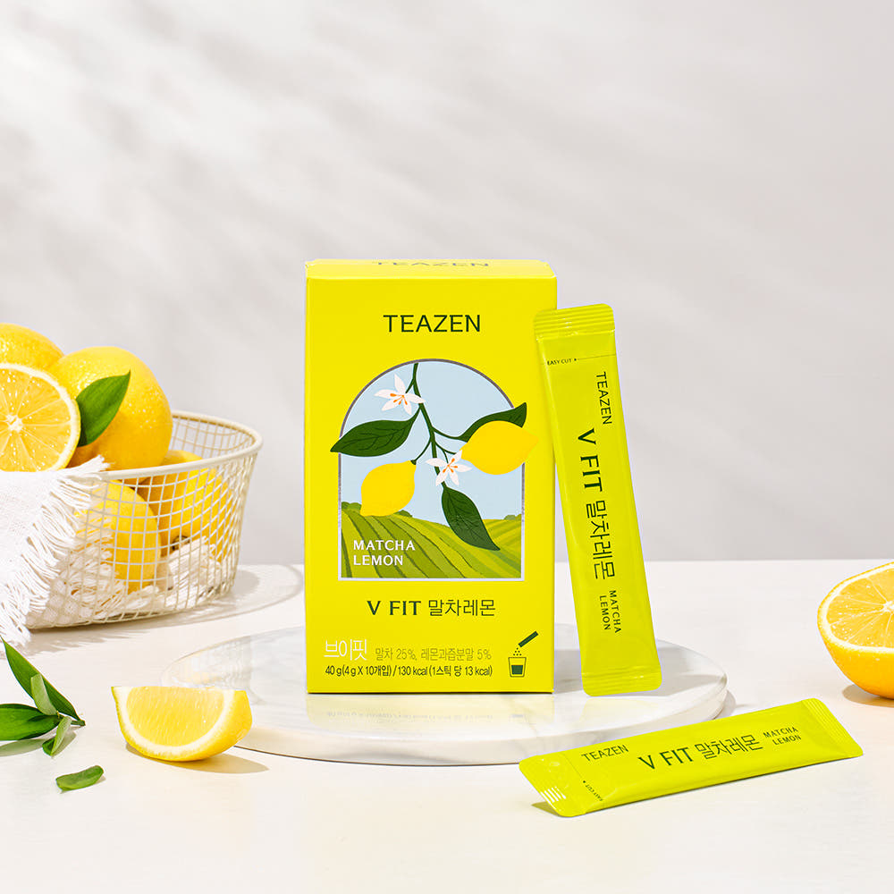 TEAZEN V-Fit Matcha Lemon 10 Sticks packaging with fresh lemons on a table.