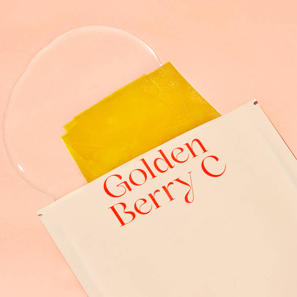 THE SAEM Urban Eco Golden Berry C Mask Sheets 10 Sheets with packaging on a pink background