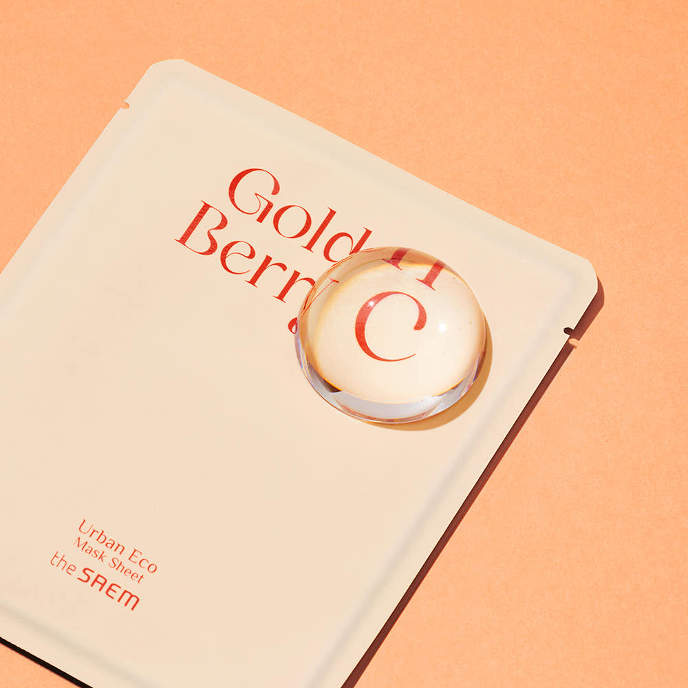 THE SAEM Urban Eco Golden Berry C Mask Sheets 10 Sheets packaging on orange background.